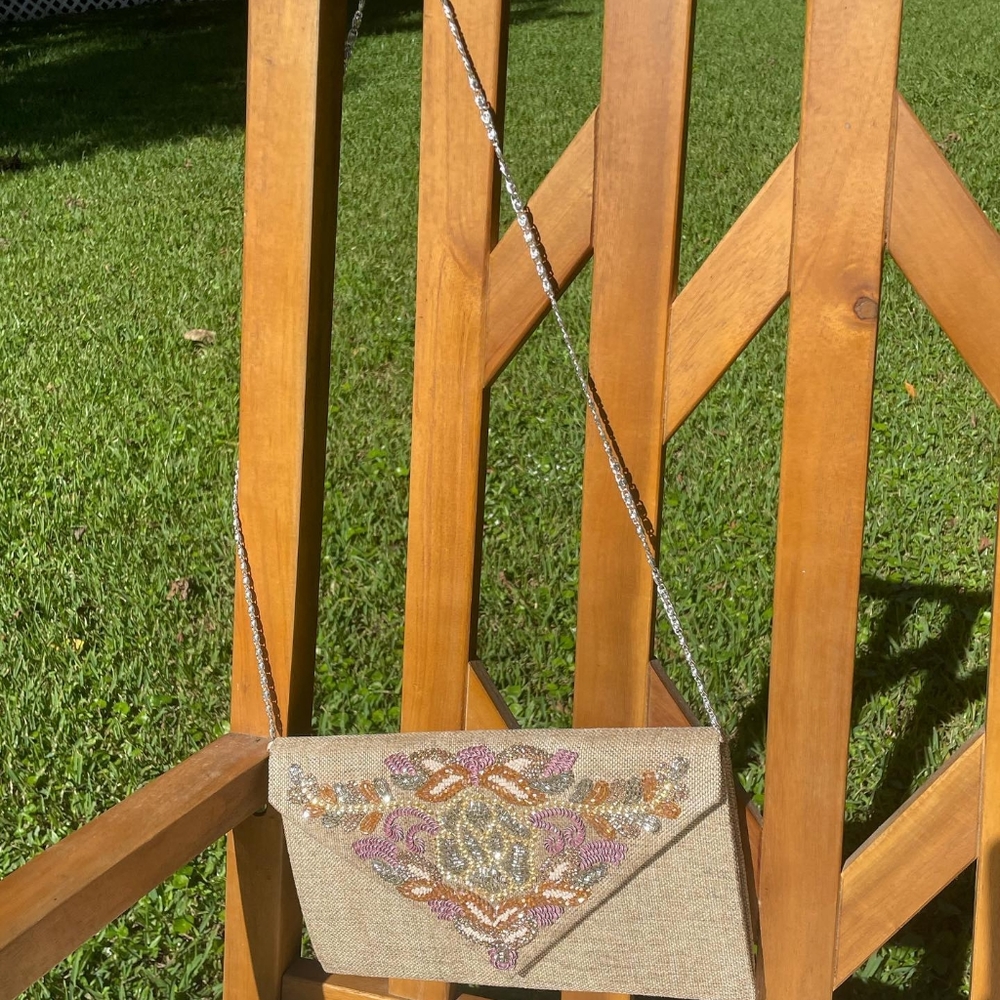 Sling bag with chain